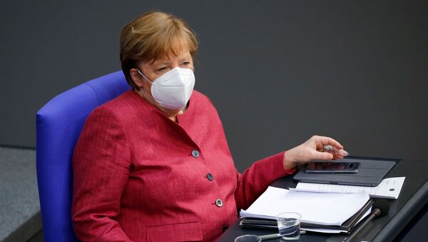 Канцлер Германии Ангела Меркель присутствует на заседании бундестага нижней палаты парламента, посвященном мерам по борьбе с коронавирусом (COVID-19), в Берлине, Германия, 16 апреля 2021 года. - 俄罗斯卫星通讯社