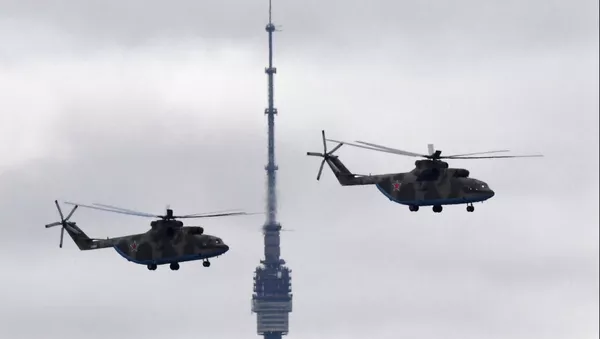 Тяжелые вертолеты Ми-26 во время воздушной части парада в честь 76-й годовщины Победы в Великой Отечественной войне в Москве. Тяжелые вертолеты Ми-26 во время воздушной части парада в честь 76-й годовщины Победы в Великой Отечественной войне в Москве. - 俄羅斯衛星通訊社
