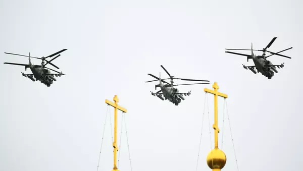 Ударные вертолеты Ка-52 Аллигатор во время воздушной части парада в честь 76-й годовщины Победы в Великой Отечественной войне в Москве. Ударные вертолеты Ка-52 Аллигатор во время воздушной части парада в честь 76-й годовщины Победы в Великой Отечественной войне в Москве. - 俄羅斯衛星通訊社