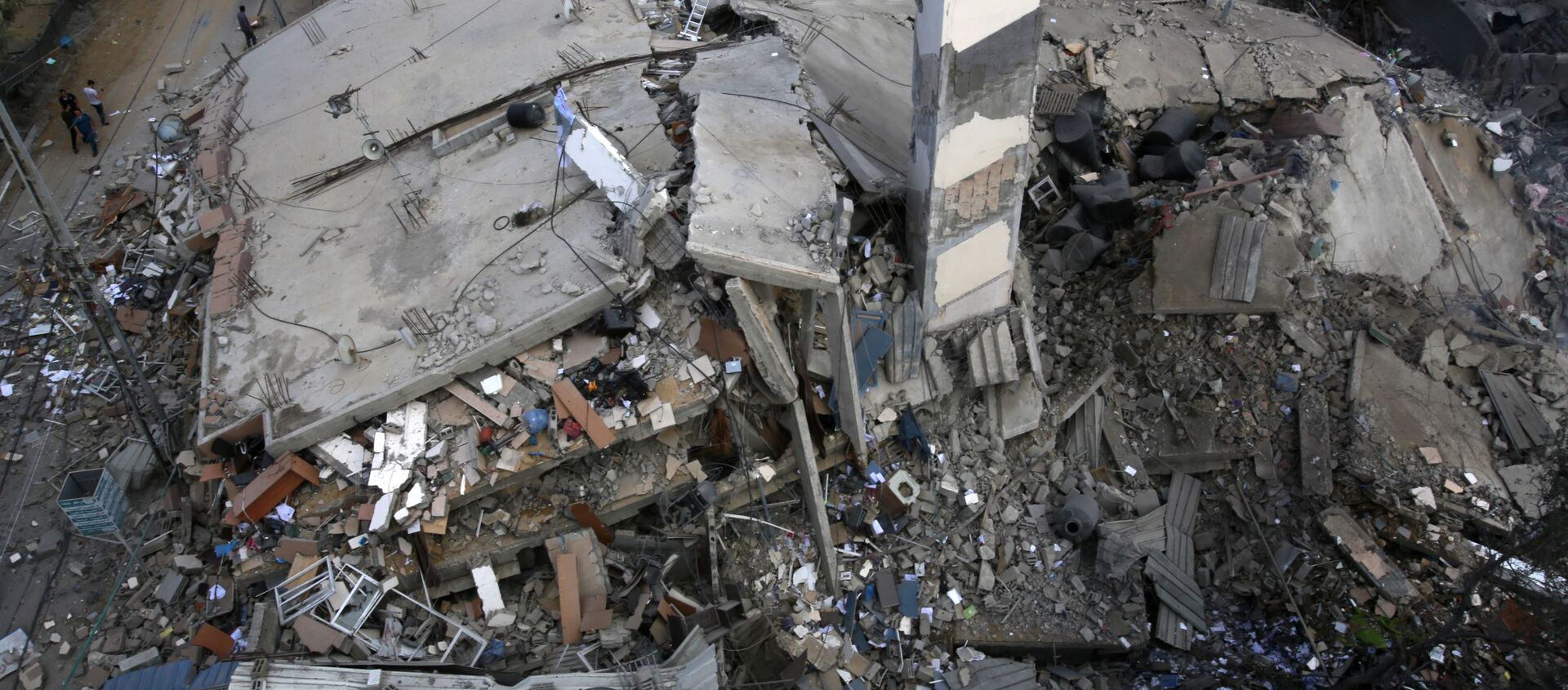 Разрушенное в результате бомбардировки здание в секторе Газа.  - 俄羅斯衛星通訊社, 1920, 19.05.2021