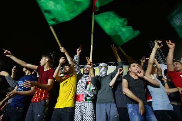 加沙地帶的巴勒斯坦居民慶祝巴以停火。
 - 俄羅斯衛星通訊社
