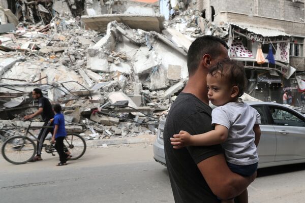 遭空襲損毀的加沙房屋。
 - 俄羅斯衛星通訊社
