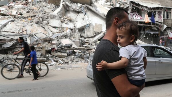 Здание, разрушенное в результате израильского авиаудара в Газе - 俄罗斯卫星通讯社