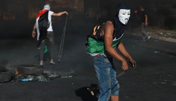 巴勒斯坦居民在贝特埃尔定居点外进行抗议活动。
 - 俄罗斯卫星通讯社