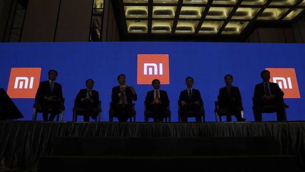 Основатель, председатель и главный исполнительный директор Xiaomi Цзюнь Лэй и другие официальные лица на пресс-конференции в Гонконге, в субботу, 23 июня 2018 г. - 俄罗斯卫星通讯社