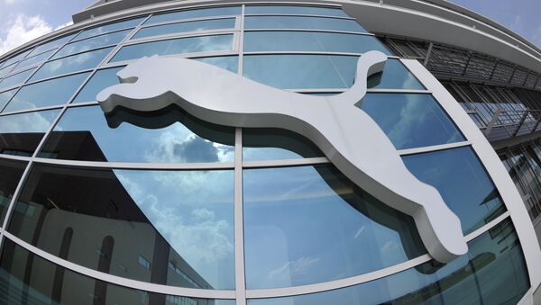 Логотип немецкого производителя спортивных товаров Puma на здании штаб-квартиры компании в Херцогенаурахе, Германия - 俄羅斯衛星通訊社