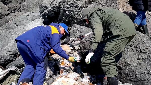 俄潛水員過去一晝夜在堪察加半島安-26飛機墜毀發現85塊遇難者屍體碎塊 - 俄羅斯衛星通訊社