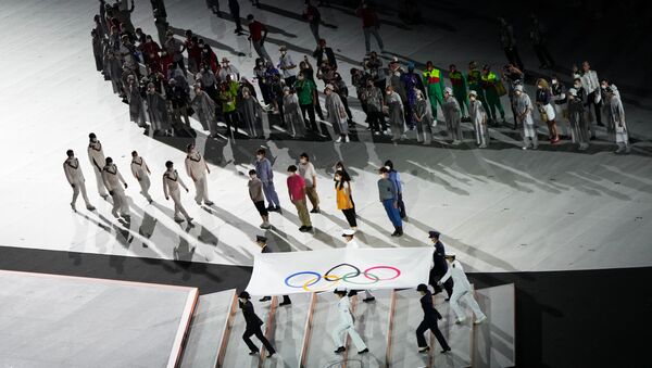 Поднятие Олимпийского флага на церемонии открытия XXXII летних Олимпийских игр в Токио. - 俄罗斯卫星通讯社
