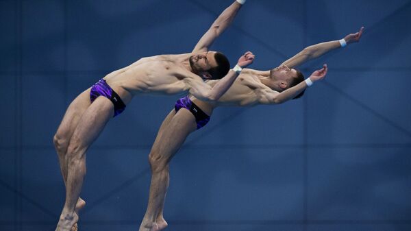邦達爾和米尼巴耶夫獲得東京奧運會雙人跳水銅牌，為俄羅斯拿下第8塊獎牌。 - 俄羅斯衛星通訊社
