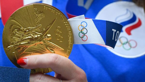 Первая золотая медаль у россиянки Виталины Бацарашкиной за победу в стрельбе из пневматического пистолета с 10 метров - 俄羅斯衛星通訊社