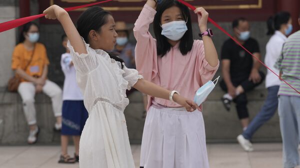 Дети в масках в Пекине - 俄羅斯衛星通訊社