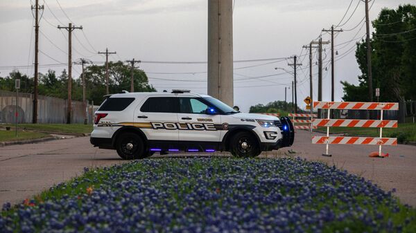 Полицейский автомобиль на месте происшествия, штат Техас. Архивное фото - 俄罗斯卫星通讯社