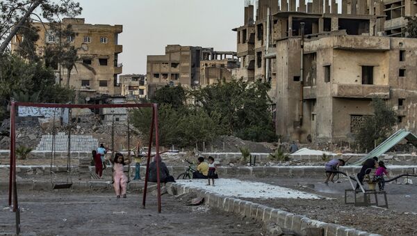 Разрушенные дома в освобожденной Эр-Ракке в Сирии - 俄罗斯卫星通讯社