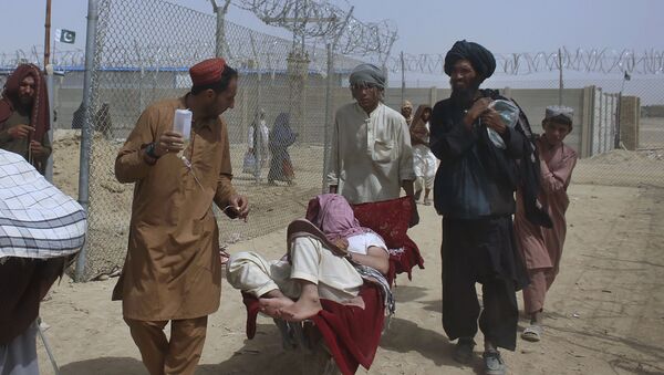 Афганские беженцы въезжают в Пакистан через пограничный переход в Чамане - 俄羅斯衛星通訊社