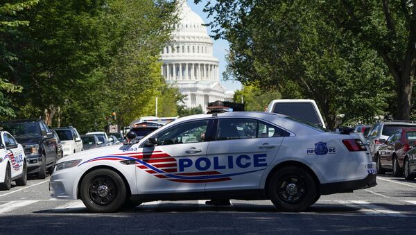 Машина полиции в районе зданий Капитолия США и библиотеки конгресса в Вашингтоне - 俄罗斯卫星通讯社