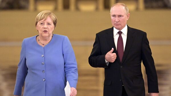  Президент РФ Владимир Путин и федеральный канцлер Германии Ангела Меркель перед началом совместной пресс-конференции - 俄罗斯卫星通讯社