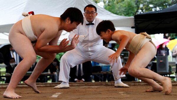Дети на турнире по сумо Junior Olympic Cup All-Japan Elementary School Sumo в Японии  - 俄罗斯卫星通讯社