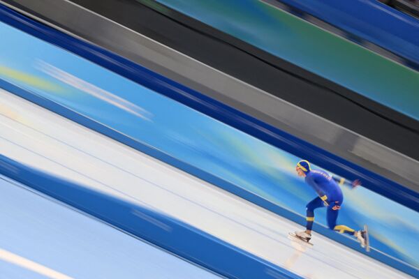 2022年北京冬奥会，瑞典选手尼尔斯·范德普尔在速度滑冰男子5000米比赛中。 - 俄罗斯卫星通讯社