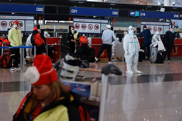 德國運動員在北京國際機場辦理登記手續。 - 俄羅斯衛星通訊社