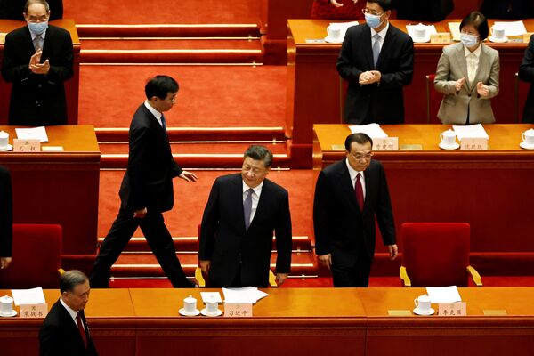 中國國家主席習近平和總理李克強 2022 年 3 月 4 日在中國北京人民大會堂出席中國人民政治協商會議開幕式。 - 俄羅斯衛星通訊社