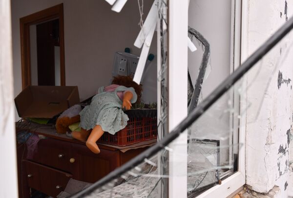 被烏軍炮火損毀的塔拉科夫卡鎮居民房。 - 俄羅斯衛星通訊社