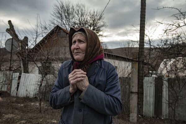 盧甘斯克人民共和國一個村莊的居民。 - 俄羅斯衛星通訊社