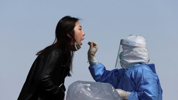 北京医务工作者为市民核酸采样。 - 俄罗斯卫星通讯社