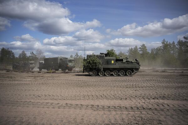 英國、拉脫維亞、愛沙尼亞和美國部隊參加正在芬蘭舉行的“箭鏃-2022”軍事演習。 - 俄羅斯衛星通訊社