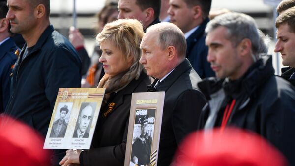 普京加入在莫斯科舉行的“不朽軍團”遊行活動
 - 俄羅斯衛星通訊社