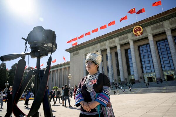 2022年10月22日，一名代表在中國共產黨第二十次全國代表大會閉幕會後接受媒體採訪。 - 俄羅斯衛星通訊社