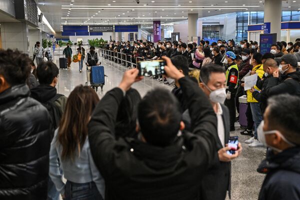 上海浦東國際機場航班到達區內的乘客。 - 俄羅斯衛星通訊社
