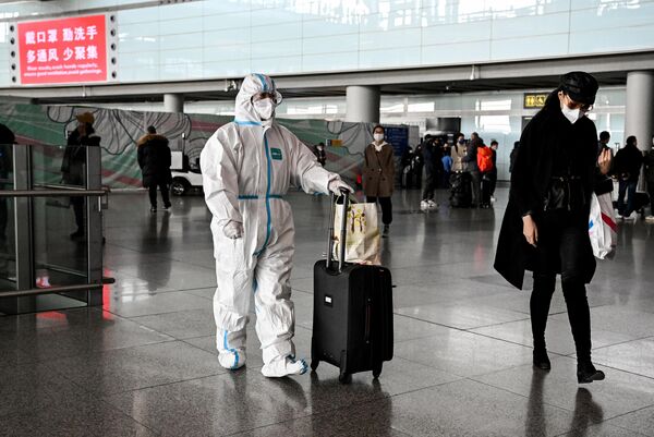北京首都國際機場航班到達區內的乘客。 - 俄羅斯衛星通訊社