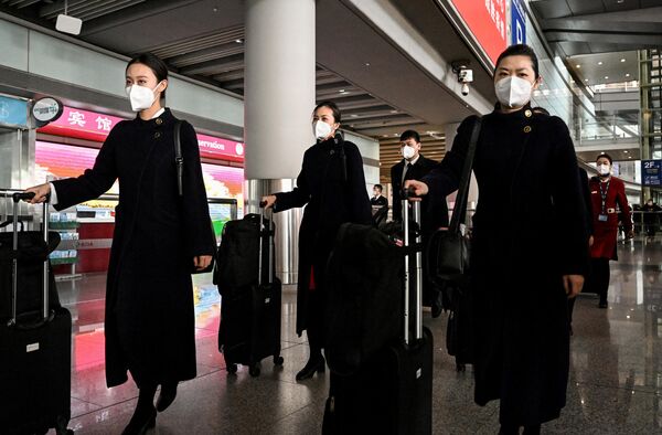 北京首都國際機場航班到達區內的空乘服務員。 - 俄羅斯衛星通訊社