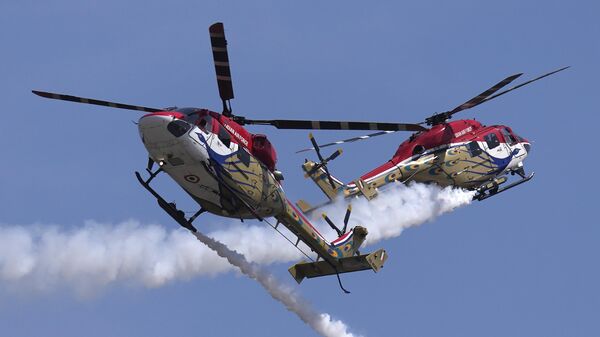 印度空軍的孔雀（Sarang）直升機在印度班加羅爾的葉拉漢卡空軍基地舉行的第14屆國際航空展的彩排中進行特技飛行表演。 - 俄羅斯衛星通訊社