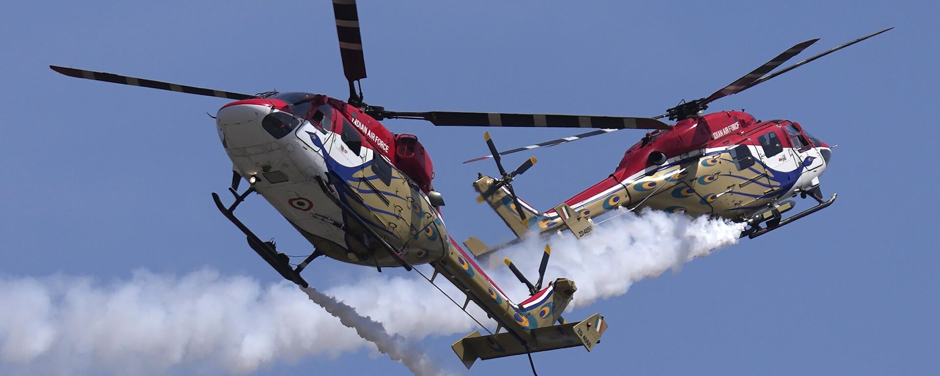 印度空軍的孔雀（Sarang）直升機在印度班加羅爾的葉拉漢卡空軍基地舉行的第14屆國際航空展的彩排中進行特技飛行表演。 - 俄羅斯衛星通訊社, 1920, 14.02.2023