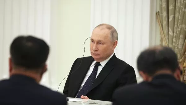 Президент РФ Владимир Путин во время встречи с главой канцелярии комиссии по иностранным делам ЦК КПК, членом Политбюро ЦК Компартии Китая Ван И Президент РФ Владимир Путин во время встречи с главой канцелярии комиссии по иностранным делам ЦК КПК, членом Политбюро ЦК Компартии Китая Ван И - 俄羅斯衛星通訊社
