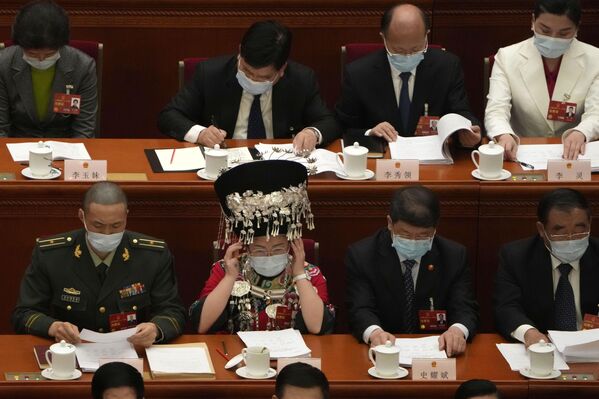 3月5日，代表們出席在人民大會堂舉行的中國全國人民代表大會開幕式。 - 俄羅斯衛星通訊社