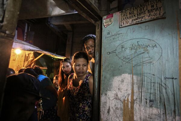 菲律賓攝影師Kimberly dela Cruz憑借系列作品《一個民族的滅亡》（Death of a Nation），獲得本屆大賽的“Southeast Asia and Oceania Long-Term Projects”類別獎項 - 俄羅斯衛星通訊社