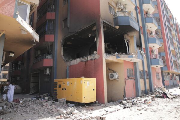 4月20日，苏丹喀土穆的住宅楼在交火中受损。喀土穆几乎一直都能听到枪声。 - 俄罗斯卫星通讯社
