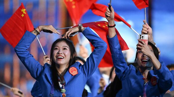 中國代表團成員出席在中國杭州舉行的第19屆亞運會開幕式
 - 俄羅斯衛星通訊社
