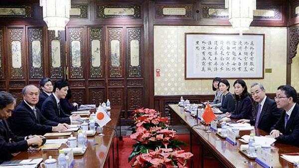 王毅在北京会见日本内阁特别顾问秋叶刚男 - 俄罗斯卫星通讯社