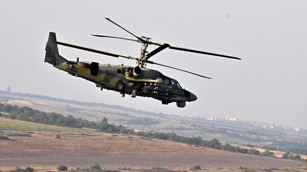 Вертолёт Ка-52 во время боевого вылета в зоне СВО - 俄罗斯卫星通讯社