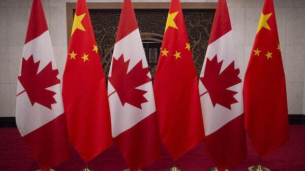 中国和加拿大国旗 - 俄羅斯衛星通訊社