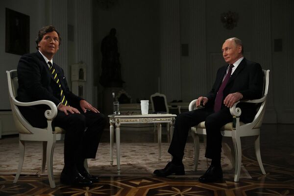 2024年2月6日，俄羅斯總統普京在莫斯科接受美國記者、“塔克·卡爾森電視網(Tucker Carlson Network)”創始人塔克·卡爾森的採訪。 - 俄羅斯衛星通訊社