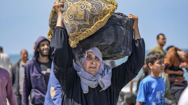 Палестинцы возвращаются на север сектора Газа - 俄羅斯衛星通訊社