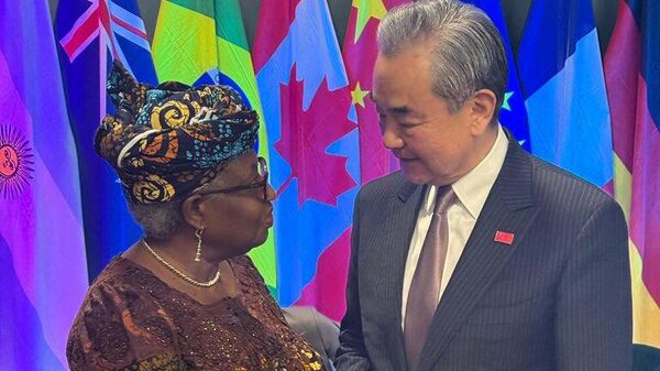 Director-General of the WTO Ngozi Okonjo-Iweala meets with H.E Wang Yi, Foreign Minister of the People's Republic of China - 俄罗斯卫星通讯社