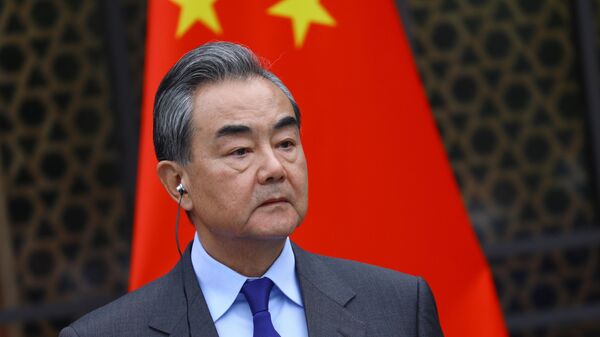 中央政治局委員，中央外事工作委員會辦公室主任，外交部部長王毅 - 俄羅斯衛星通訊社