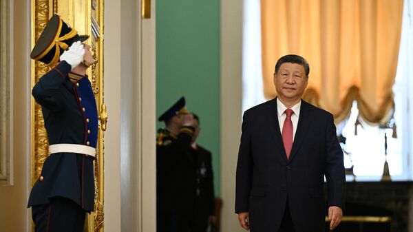 时评人：习近平访俄有助于进一步加强两国政治互信 - 俄罗斯卫星通讯社