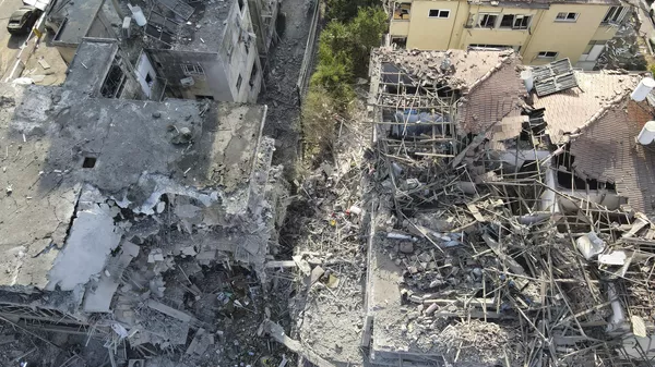 Разрушенные жилые дома, пострадавшие от ракеты, выпущенной из Ирана, Рамат-Ган, Израиль - 俄罗斯卫星通讯社