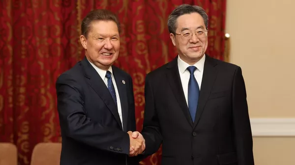 俄羅斯天然氣工業股份公司（Gazprom）總裁阿列克謝·米勒與中國國務院副總理丁薛祥 - 俄羅斯衛星通訊社